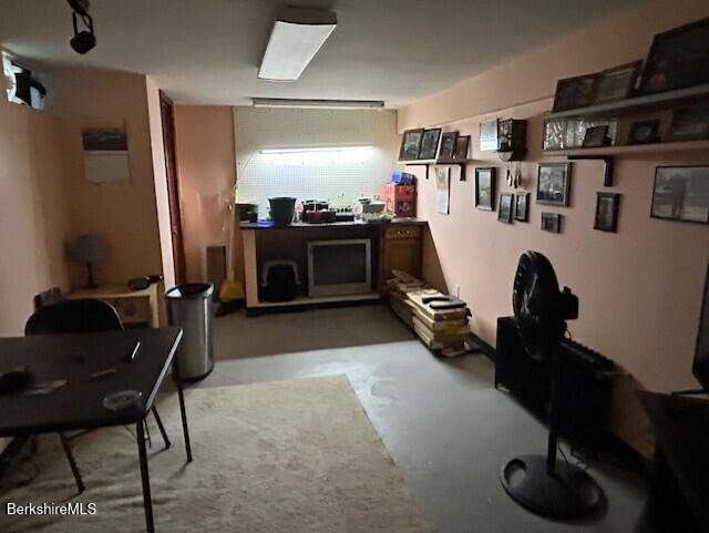miscellaneous room with finished concrete flooring