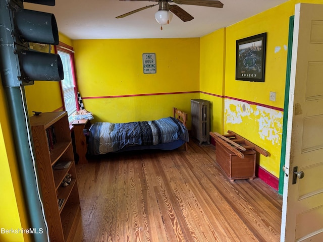 145 Bartlett Ave, Pittsfield, MA 01201 - bedroom featuring wood finished floors, ceiling fan, and radiator