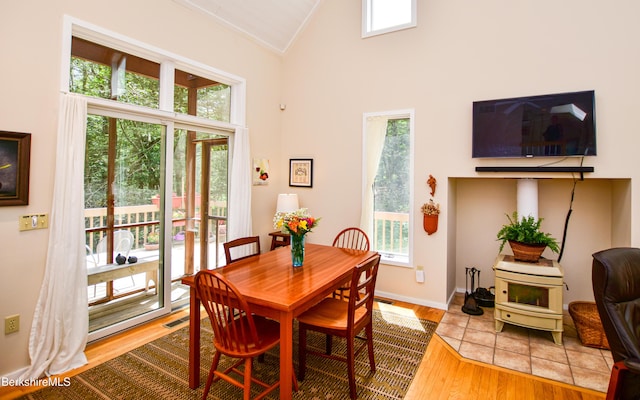 345 Big Bass Ln, Becket, MA 01223 - dining space featuring healthy amount of natural light, wood finished floors, ornamental molding, and high vaulted ceiling