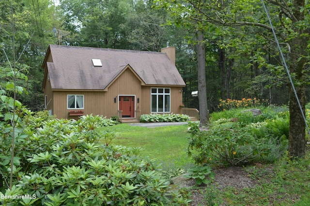 345 Big Bass Ln, Becket, MA 01223 - view of front of home featuring roof with shingles, a chimney, and a front yard