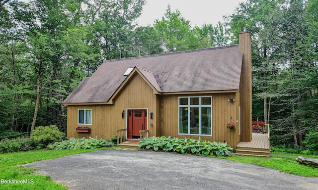 345 Big Bass Ln, Becket, MA 01223 - rustic home featuring a chimney, a shingled roof, and driveway