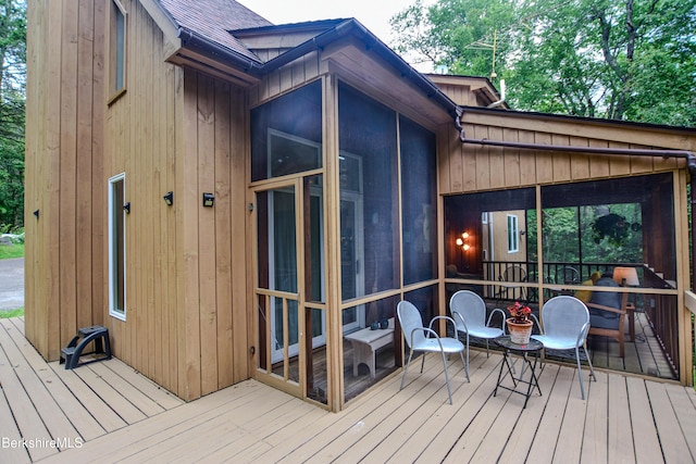 345 Big Bass Ln, Becket, MA 01223 - wooden terrace with a sunroom