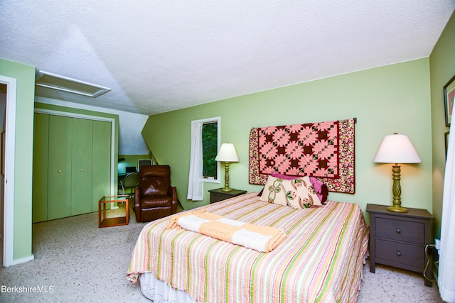 345 Big Bass Ln, Becket, MA 01223 - bedroom with attic access, a textured ceiling, and a closet
