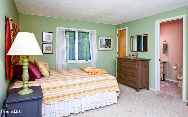 345 Big Bass Ln, Becket, MA 01223 - carpeted bedroom with a textured ceiling and ensuite bath
