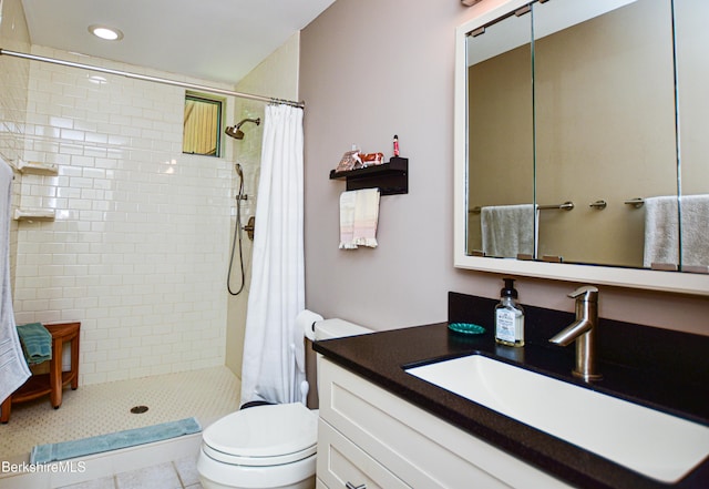 345 Big Bass Ln, Becket, MA 01223 - bathroom with tiled shower, vanity, recessed lighting, and tile patterned flooring