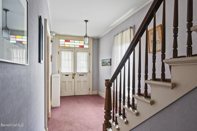 232 First St, Pittsfield, MA 01201 - entryway with carpet flooring, ornamental molding, stairway, and baseboards
