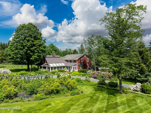 1151 Hancock Rd, Williamstown, MA 01267 - rear view of property featuring a chimney, a yard, and view of scattered trees