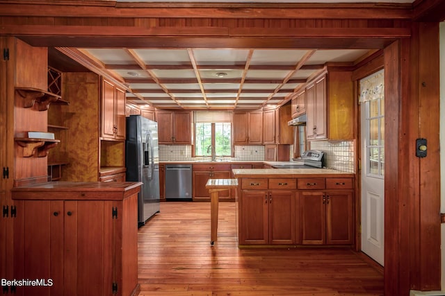 kitchen with coffered ceiling, sink, decorative backsplash, light wood-type flooring, and stainless steel appliances