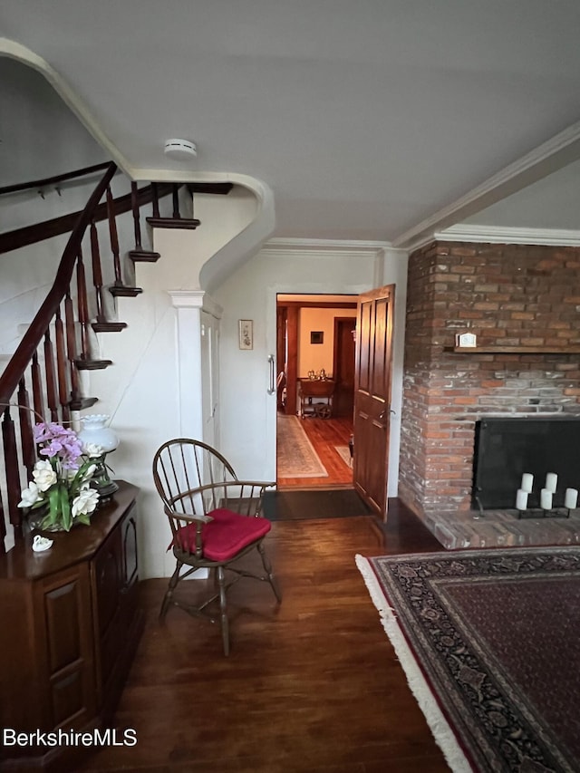 corridor with crown molding and dark hardwood / wood-style flooring