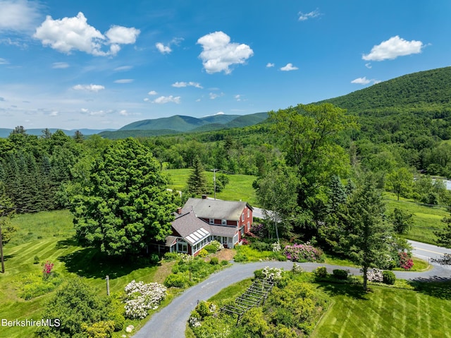 birds eye view of property featuring a mountain view