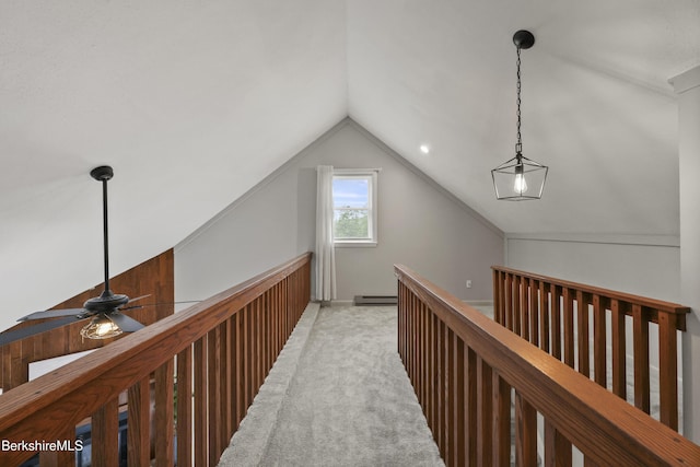 94 Corey Rd Unit D, Hancock, MA 01237 - corridor featuring baseboard heating, light colored carpet, and vaulted ceiling