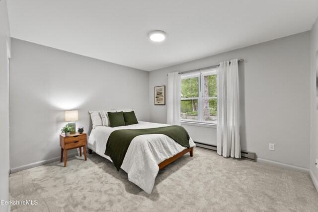 94 Corey Rd Unit D, Hancock, MA 01237 - carpeted bedroom with baseboards and a baseboard radiator