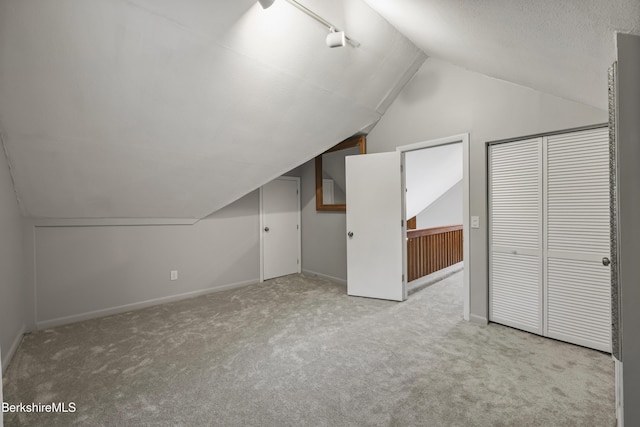 94 Corey Rd Unit D, Hancock, MA 01237 - additional living space with carpet floors, lofted ceiling, and baseboards