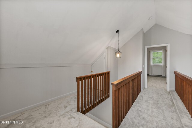 94 Corey Rd Unit D, Hancock, MA 01237 - hallway featuring an upstairs landing, carpet flooring, lofted ceiling, and baseboards