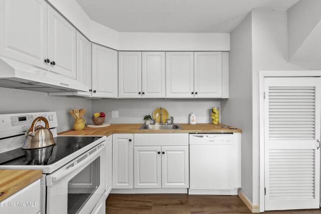 94 Corey Rd Unit D, Hancock, MA 01237 - kitchen with white appliances, a sink, under cabinet range hood, wood counters, and white cabinetry