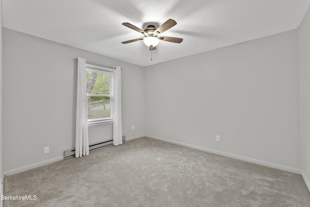 94 Corey Rd Unit D, Hancock, MA 01237 - empty room featuring ceiling fan, carpet floors, a baseboard radiator, and baseboards