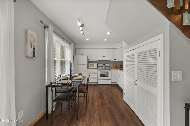 94 Corey Rd Unit D, Hancock, MA 01237 - kitchen featuring white appliances, recessed lighting, dark wood-style floors, under cabinet range hood, and white cabinets