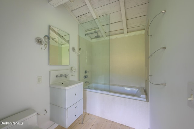 full bathroom with bath / shower combo with glass door, vanity, hardwood / wood-style flooring, wooden ceiling, and toilet