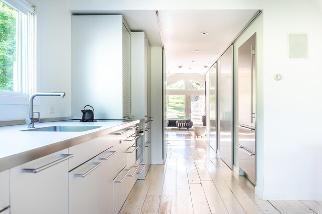 bathroom featuring hardwood / wood-style floors and sink