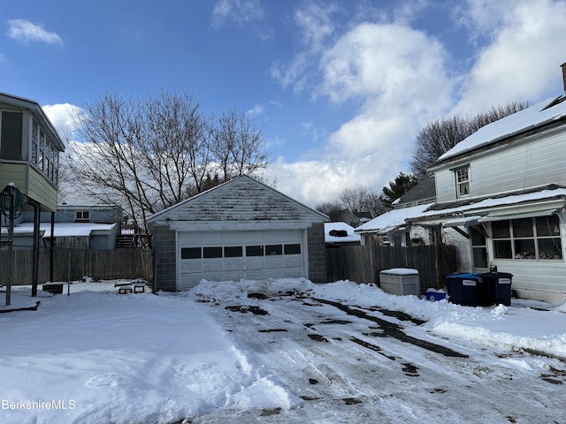 view of snow covered garage