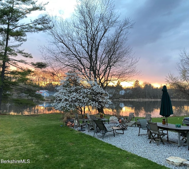 3 Swamp Rd, West Stockbridge, MA 01266 - yard at dusk with a yard, a water view, and a patio