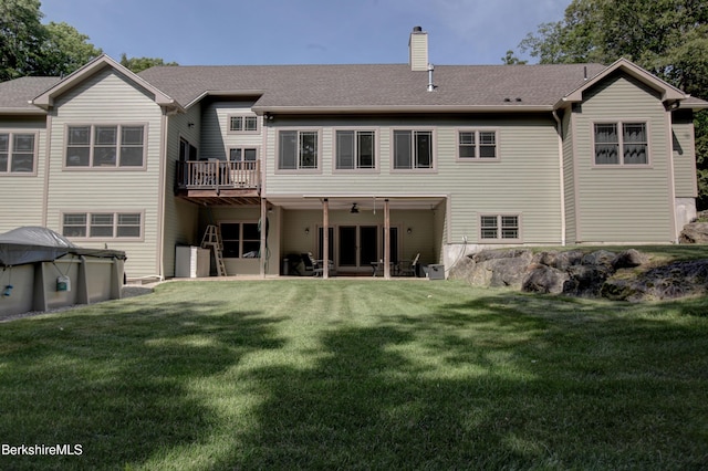 7 Perry Rd, Sandisfield, MA 01255 - back of property featuring a chimney and a yard