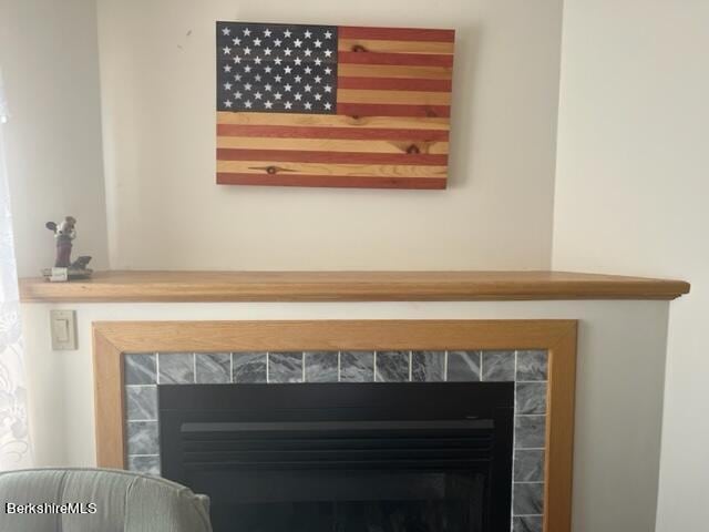 interior details with a fireplace