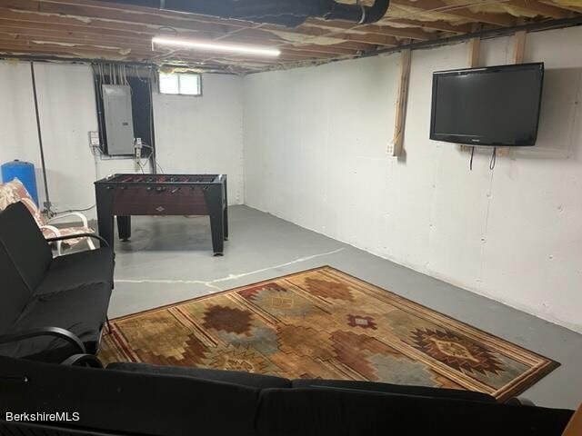 interior space featuring concrete flooring and electric panel