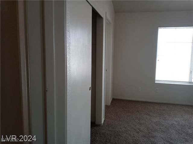 unfurnished bedroom featuring carpet flooring