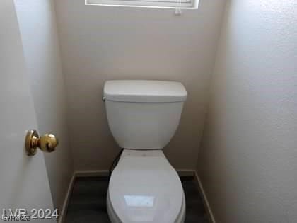 bathroom featuring toilet