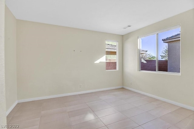 view of tiled spare room