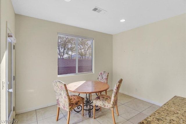 view of tiled dining space