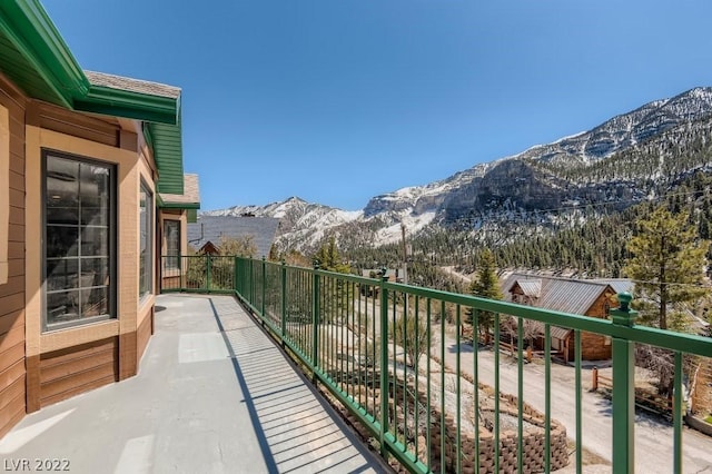 balcony featuring a mountain view