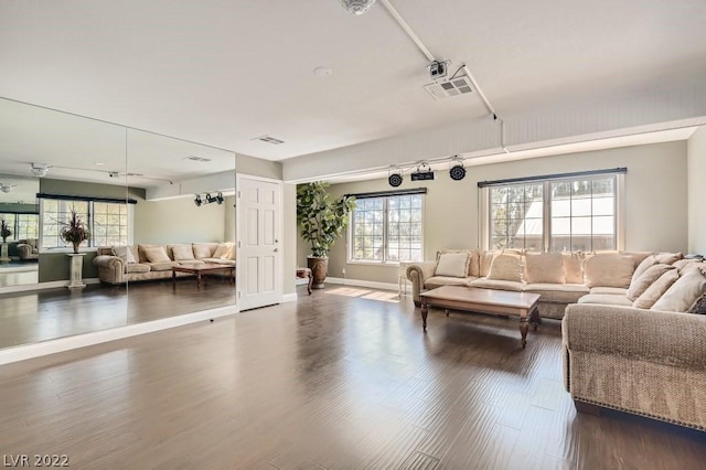 living room featuring dark hardwood / wood-style floors