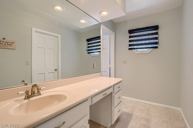 bathroom with tile flooring and oversized vanity