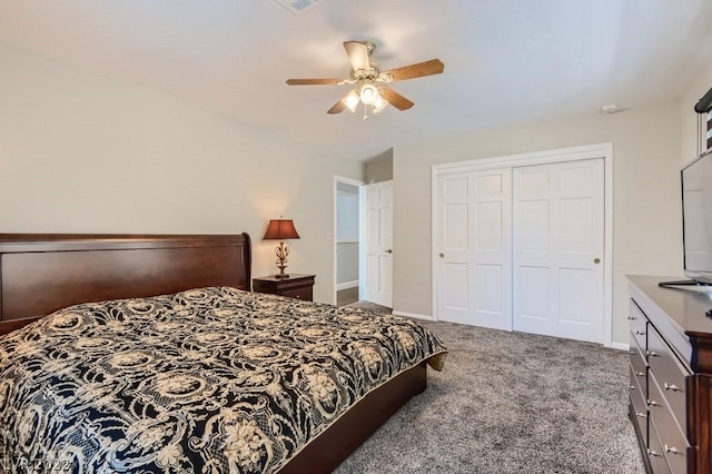 carpeted bedroom featuring a closet and ceiling fan