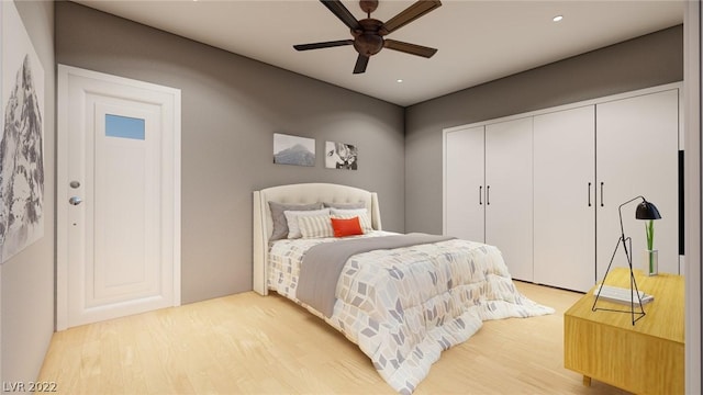 bedroom with ceiling fan and light wood-type flooring