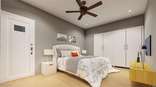 bedroom featuring ceiling fan and light wood-type flooring