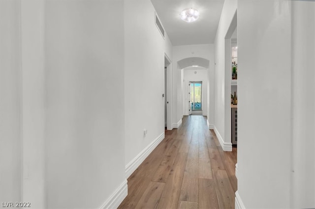 hallway featuring light hardwood / wood-style flooring