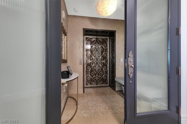 bathroom with tile flooring