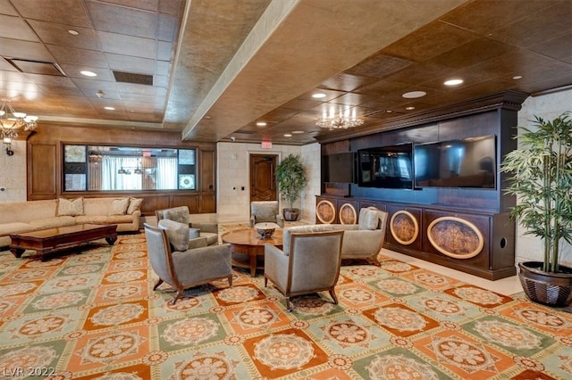 cinema room featuring a notable chandelier