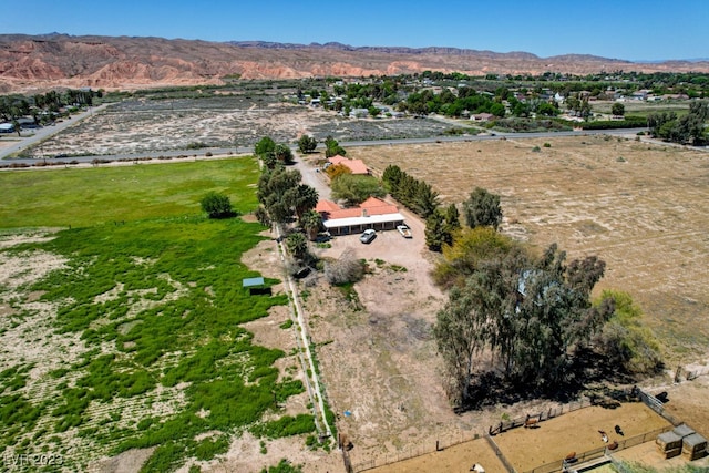 birds eye view of property featuring a mountain view and a rural view