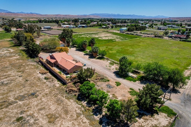 aerial view featuring a mountain view and a rural view