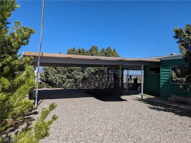 view of parking featuring a carport