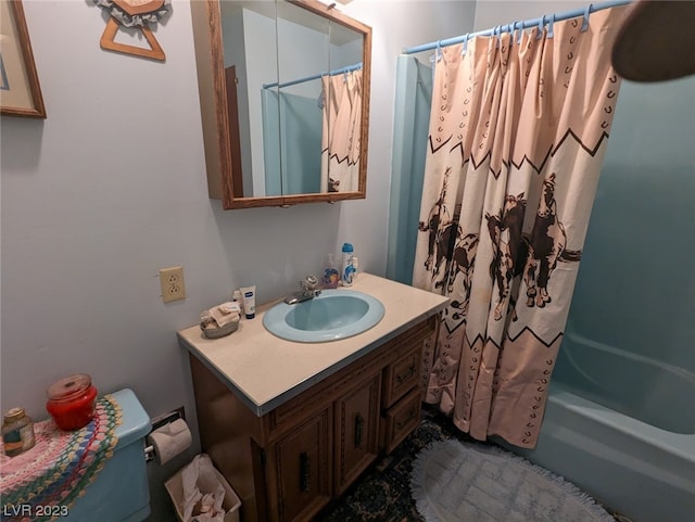 full bathroom featuring vanity, shower / bath combo, and toilet