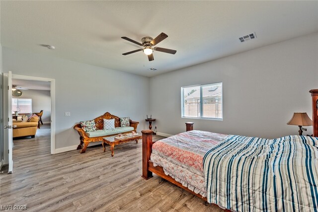 bedroom featuring ceiling fan and light wood-type flooring