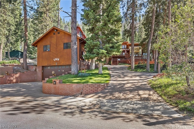 view of property exterior featuring a garage