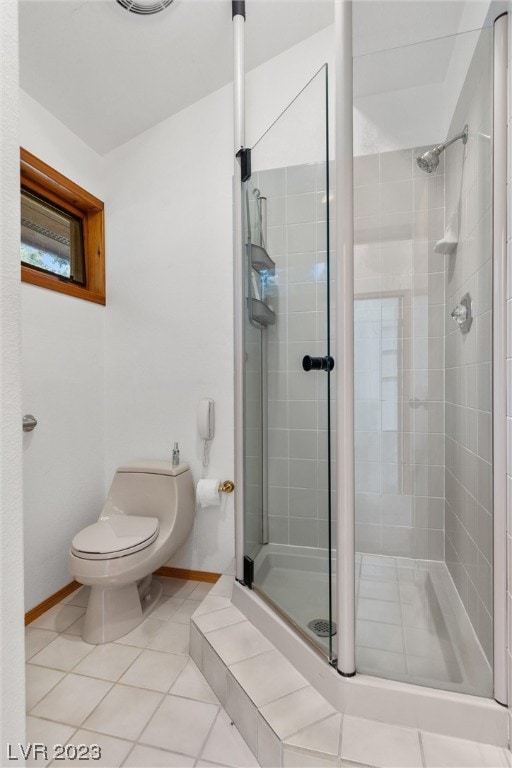 bathroom with walk in shower, toilet, and tile patterned floors