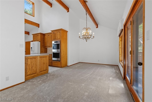 interior space with stainless steel double oven, white refrigerator with ice dispenser, light carpet, a notable chandelier, and beamed ceiling