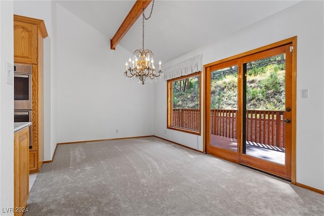 unfurnished dining area featuring plenty of natural light, an inviting chandelier, and light carpet